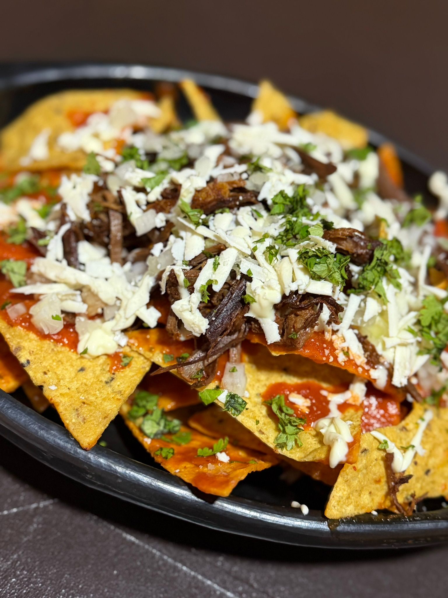 Chilaquiles con carne y queso